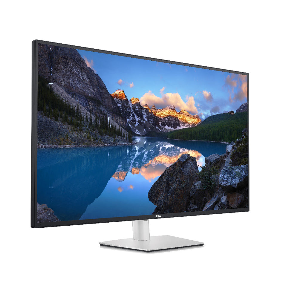Dell monitor displaying a mountainous landscape on a white background