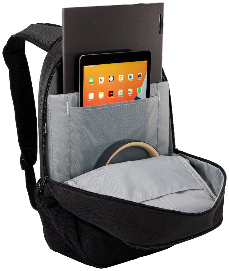 Black backpack with a gray interior pocket containing a tablet and headphones on a white background
