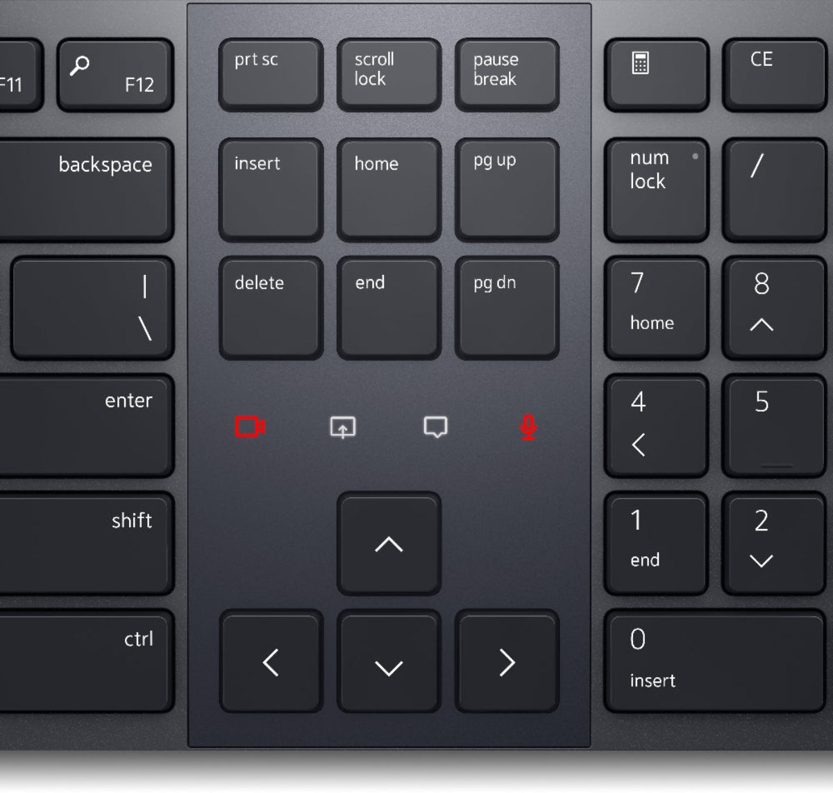 Close-up of a black keyboard with various function keys and navigation keys.